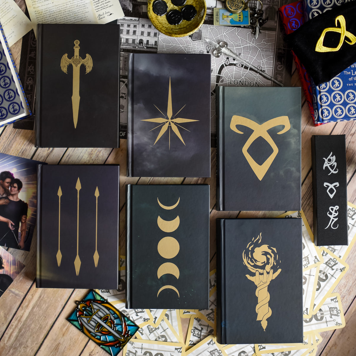 Special Edition The Mortal Instruments Box Set featuring all six books in the series with gold Shadowhunter runes on covers