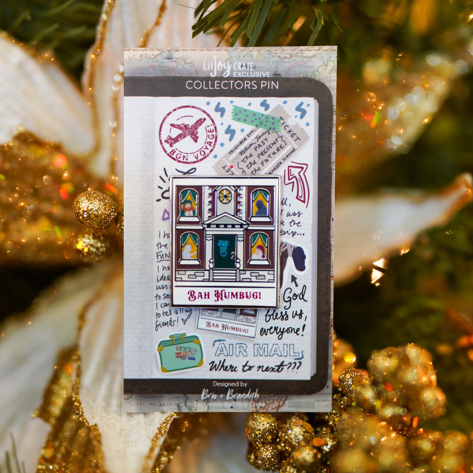 A Christmas Carol Polaroid Enamel Pin featuring the ghosts of Christmas Past, Present, Future, and Scrooge's business partner Marley in the windows.  