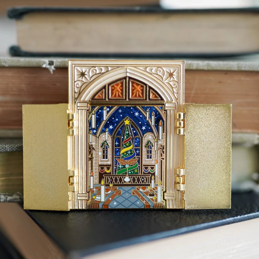 Gold Great Hall Enamel Pin with brown doors that open to reveal the inside of the hall for witches and wizards.