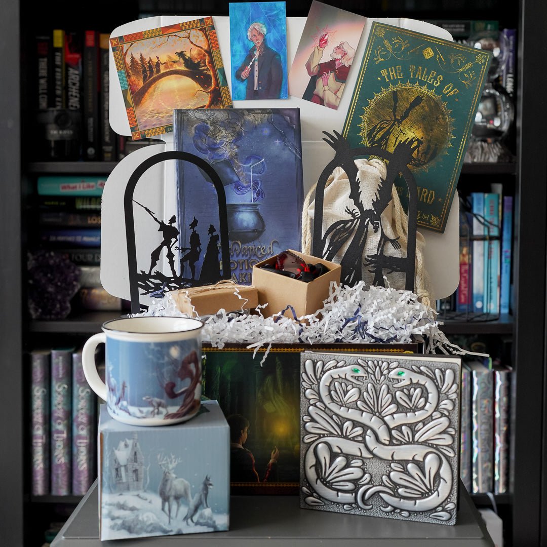 Legends and Lore Crate comes with bookends, book box with puzzle, notebook, mug, philosopher&#39;s stone, print, and Adventure Card