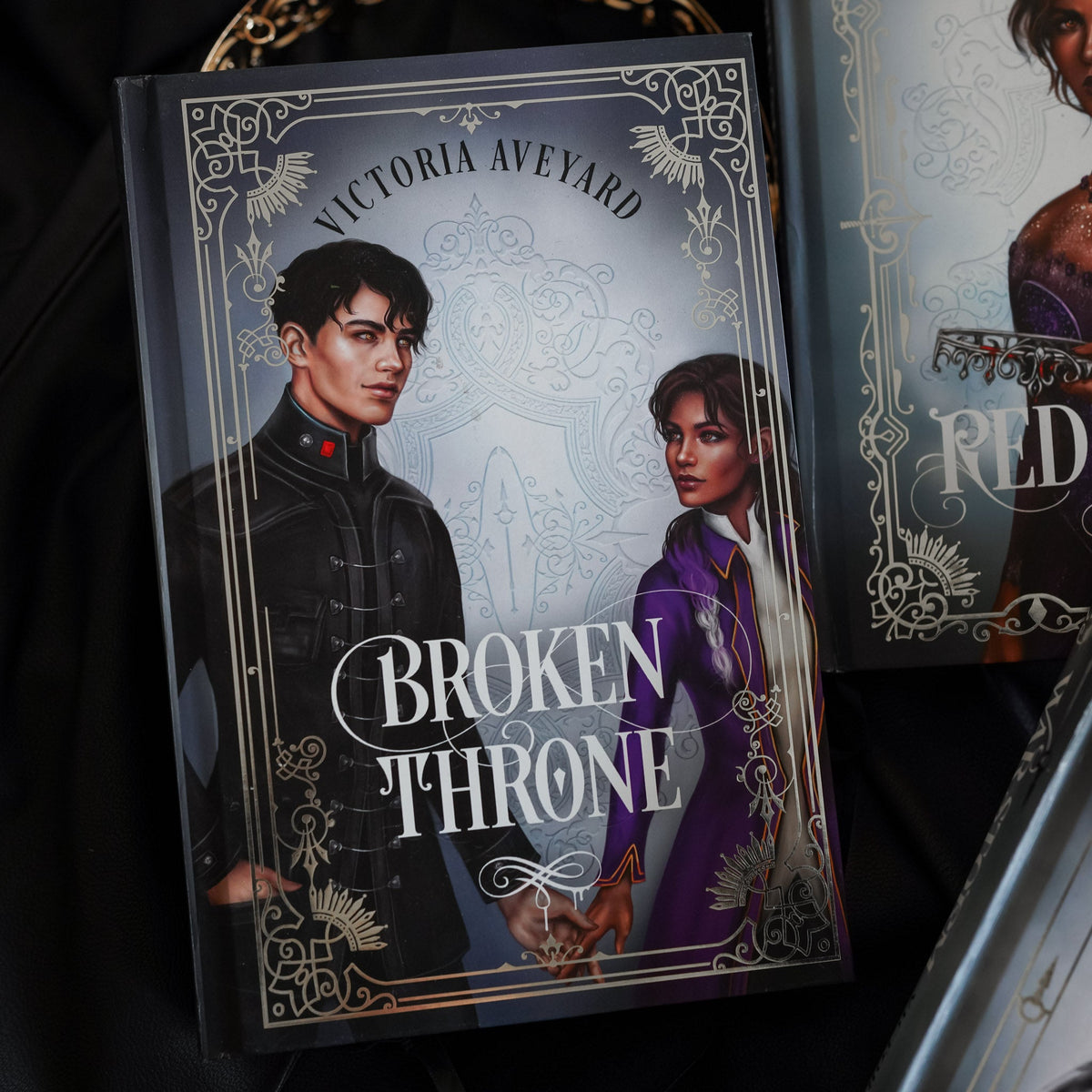Broken Throne book 5 featuring Mare and Cal holding hands, without a crown standing between them