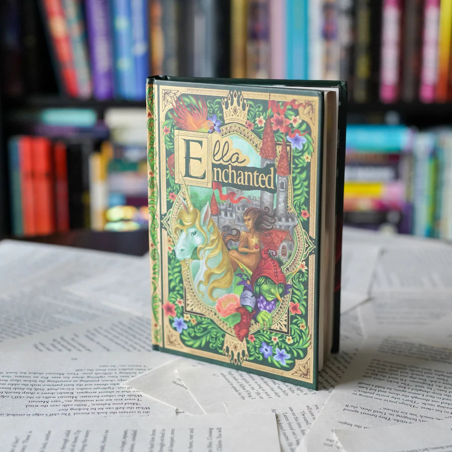 Ella Enchanted book where Fairytale characters from fill the front and back oval frames, surrounded by green and gold embossed borders.