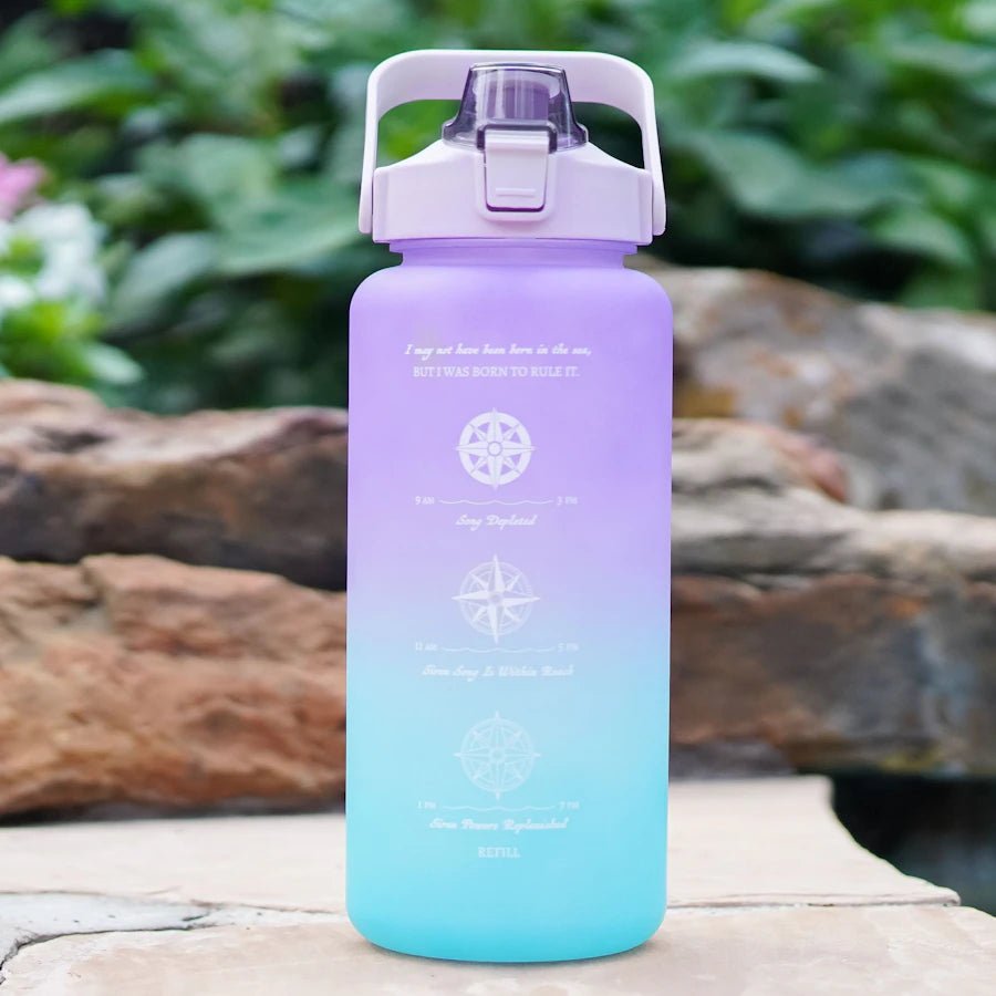 Daughter of the Pirate King Siren Power Water Bottle is a large water bottle with straw, flip lid, in purple/teal ombre.