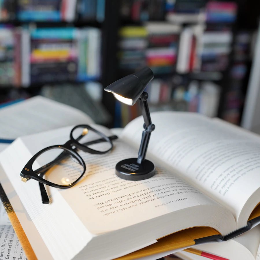 Tiny desk lamp to light up your night reading! With &quot;Just Another Chapter&quot; written on the base, it&#39;s the best bookish gift