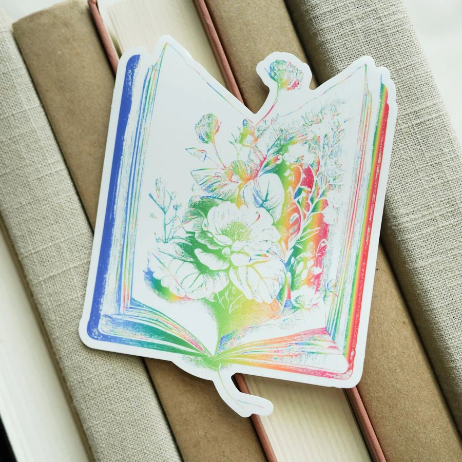 Rainbow Book Flower Transparent Sticker is a square translucent holograph sticker with flowers emerging from an open book