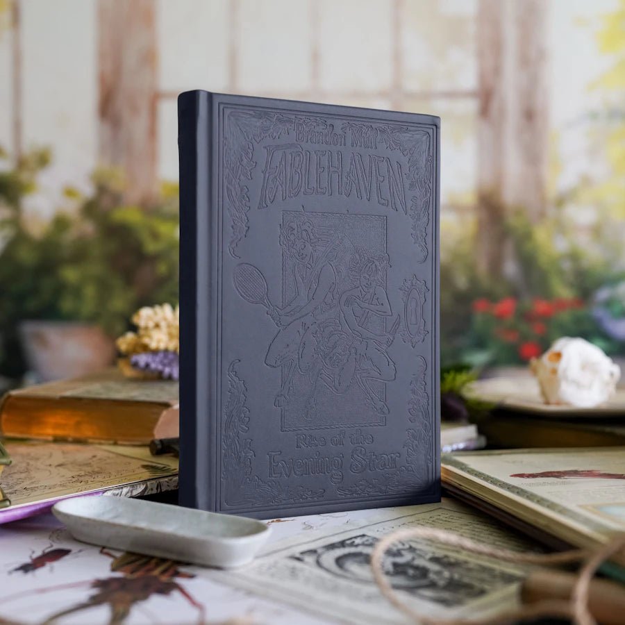 Fablehaven: Rise of the Evening Star has debossed illustrations on a leatherette cover, playful endpapers, and gilded edges.