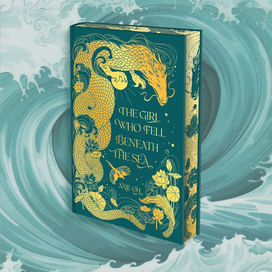 A sea dragon winds around the Wibalin cover in gold foil along with hidden images from the story.