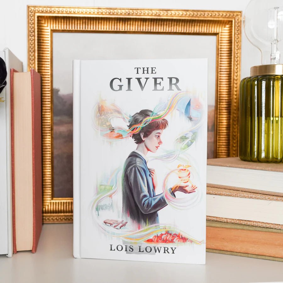 The Giver LitJoy Edition cover: Jonas in grey with memories swirling around adding color to his life, the Giver on back cover