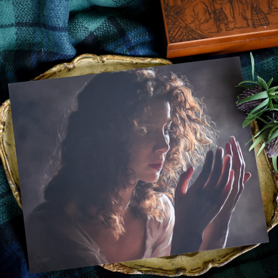 Claire Art Print features the curly haired Sassenach staring at the two wedding rings on her hands