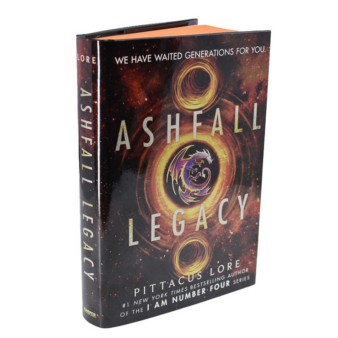 Ashfall Legacy by Pittacus Lore with dustjacket of dragon, circles of light, and outerspace