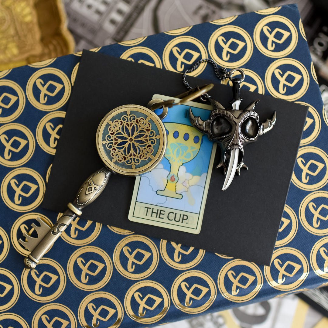 Cassandra Clare’s New York Institute Key for Shadowhunters. Includes key and 2 charms: tarot card &amp; demon with seraph blade.