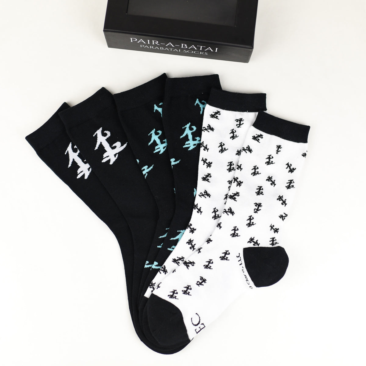 Parabatai Sock Set with two black and one white pair of fashion socks with runes from Cassandra Clare&#39;s Shadowhunter Series