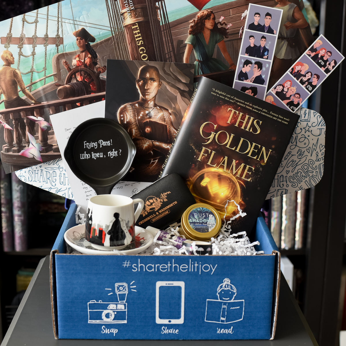 Journey To Belong Crate comes with The Golden Flame book, a small frying pan, a teacup and saucer, candle and more!
