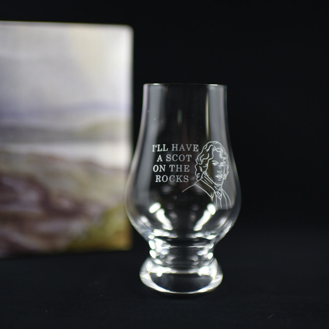 Scot Whiskey Glass is clear with a bell shape and the words &quot;I&#39;ll have a Scot on the rocks&quot; etched on it along with a handsome highlander&#39;s head