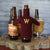 Magical Family Mini Sweater is on a bottle and is maroon with a yellow "W" embroidered on the front