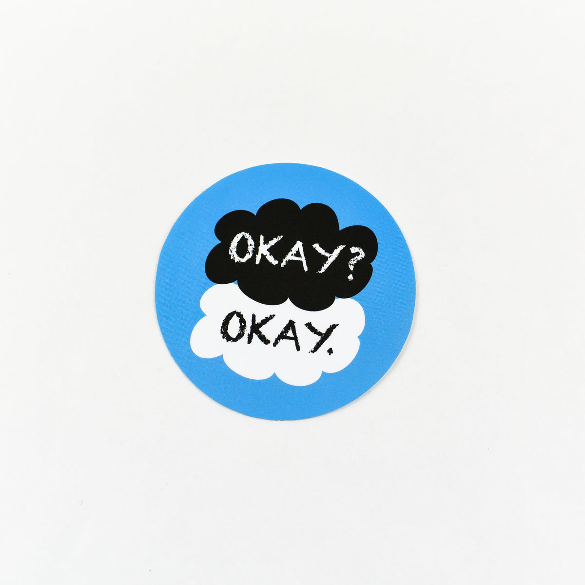 The Fault in Our Stars Sticker is a blue circle and a black cloud and a white cloud with the words &quot;Okay? Okay.&quot;