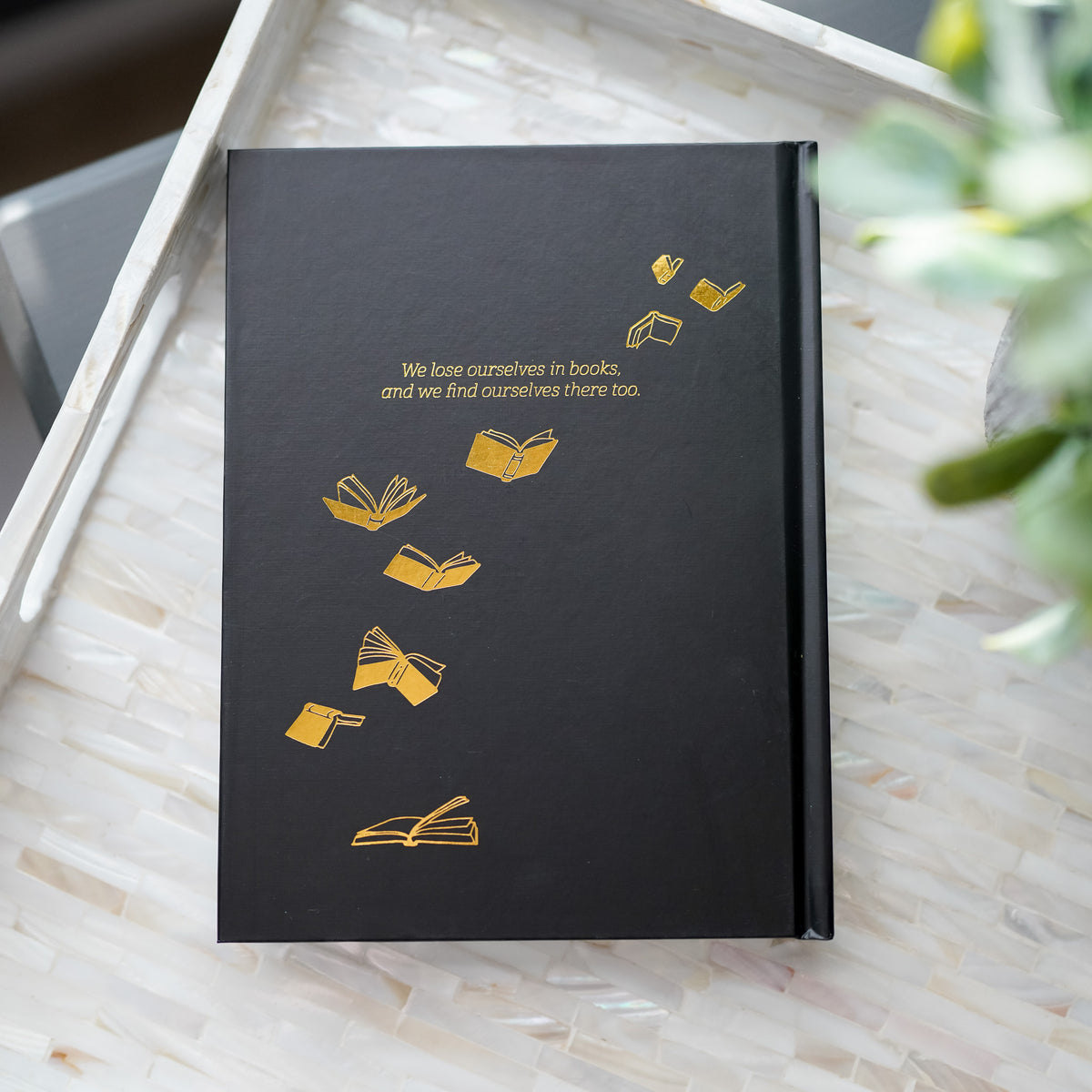 Onyx Reading Journal with Black cover and gold lettering with the words &quot;The Reading Journal&quot; and flying books