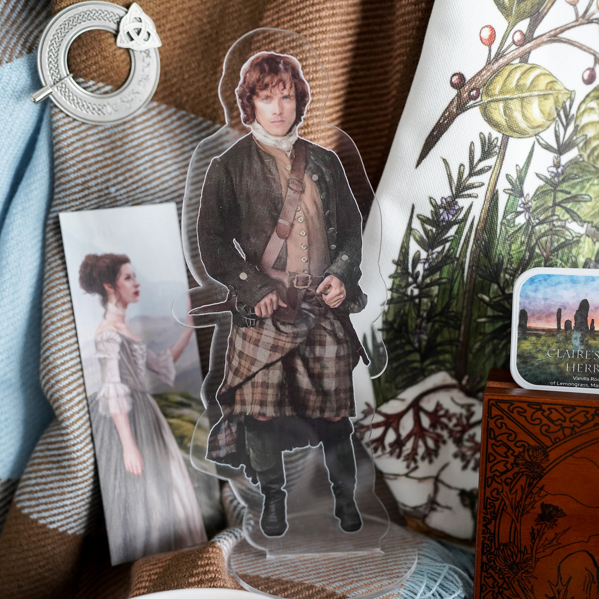 Pocket Sized Jamie Standee is a hunky scottish man with reddish hair and a plaid kilt