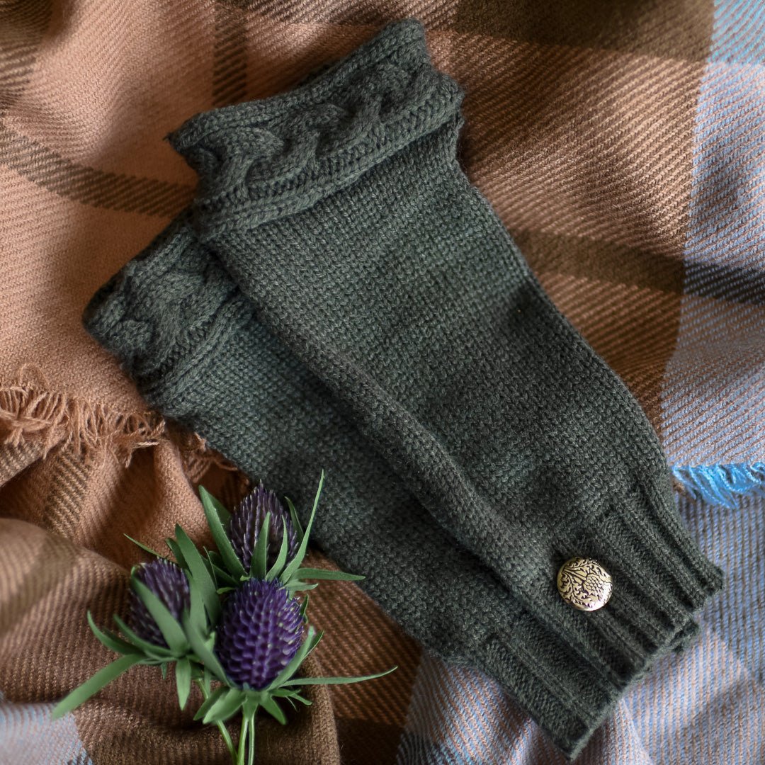 Claire&#39;s Knit Gloves feature a gold button on the wrist of these forest green fingerless gloves