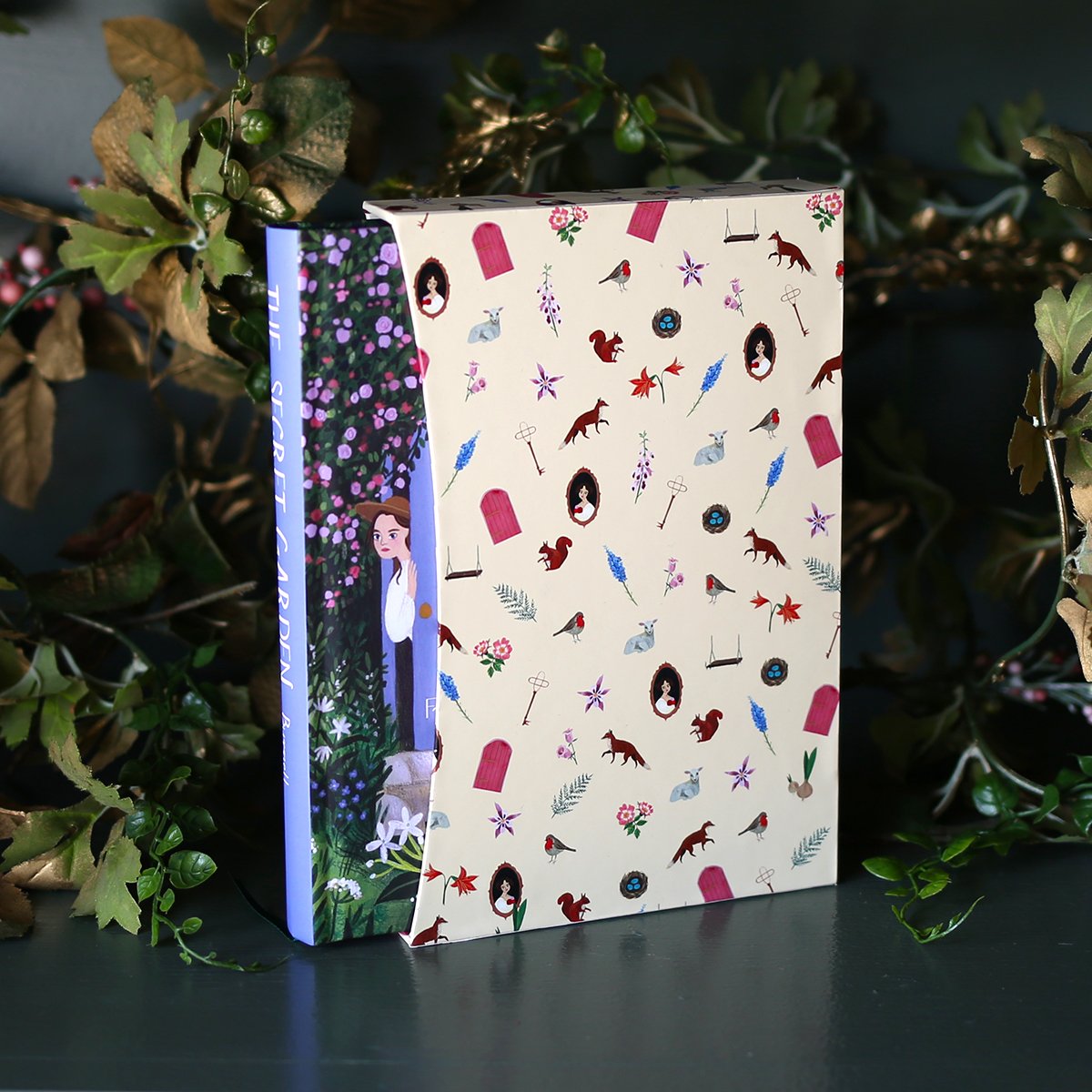 The Secret Garden special edition with a custom slipcase and illustrations with garden aesthetic and purple stained edges