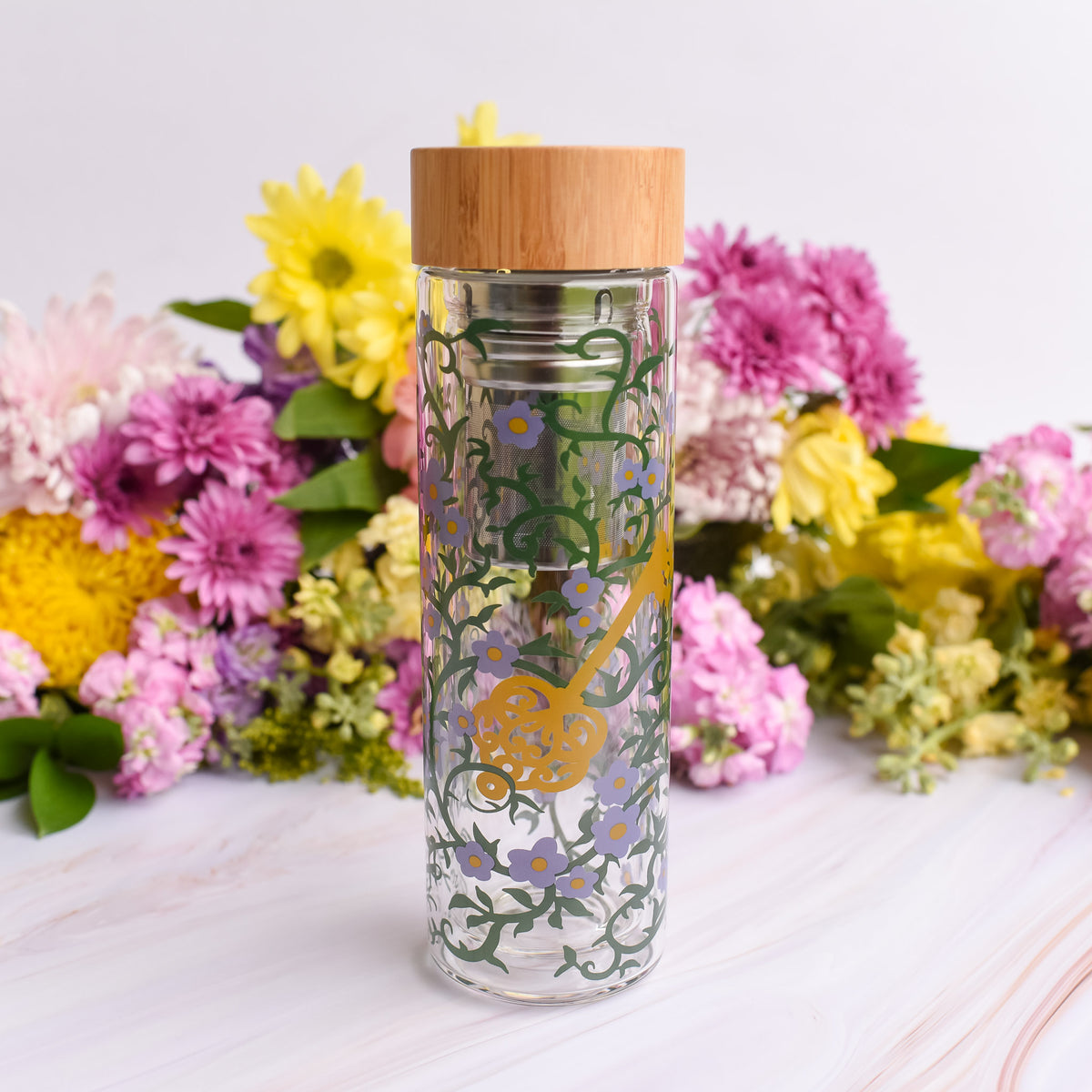 The Secret Garden Glass Water Bottle with bamboo lid and removable tea infuser or fruit infuser