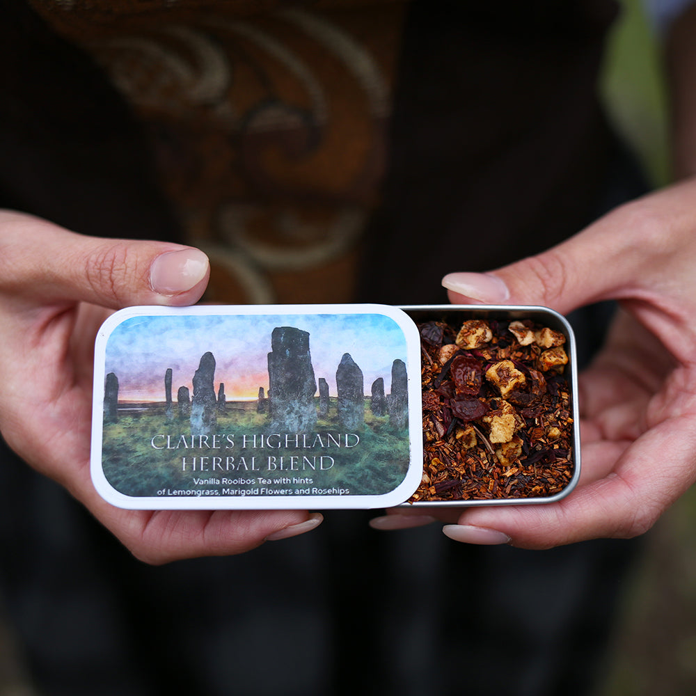 Claire&#39;s Highland Blend Tea Tin filled with loose leaf tea and an image on the standing stones on the front