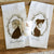 Jane Eyre Mug and Tea Towel Set with profiles portraits of Jane and Mr. Rochester, as well as a mug with a quote from the book.