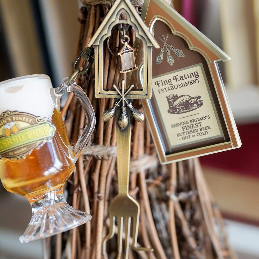 Fork-shaped Wizard Inn &amp; Pub Key Collectible with hanging sign and beer mug charms