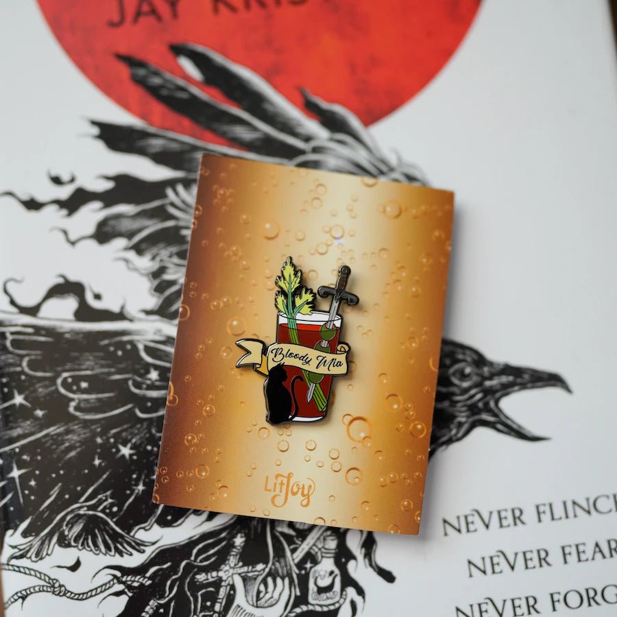 Jay Kristoff Nevernight Bloody Mia Cocktail Enamel Pin is a bloody mary garnished with celery, olives on a sword, and a black cat