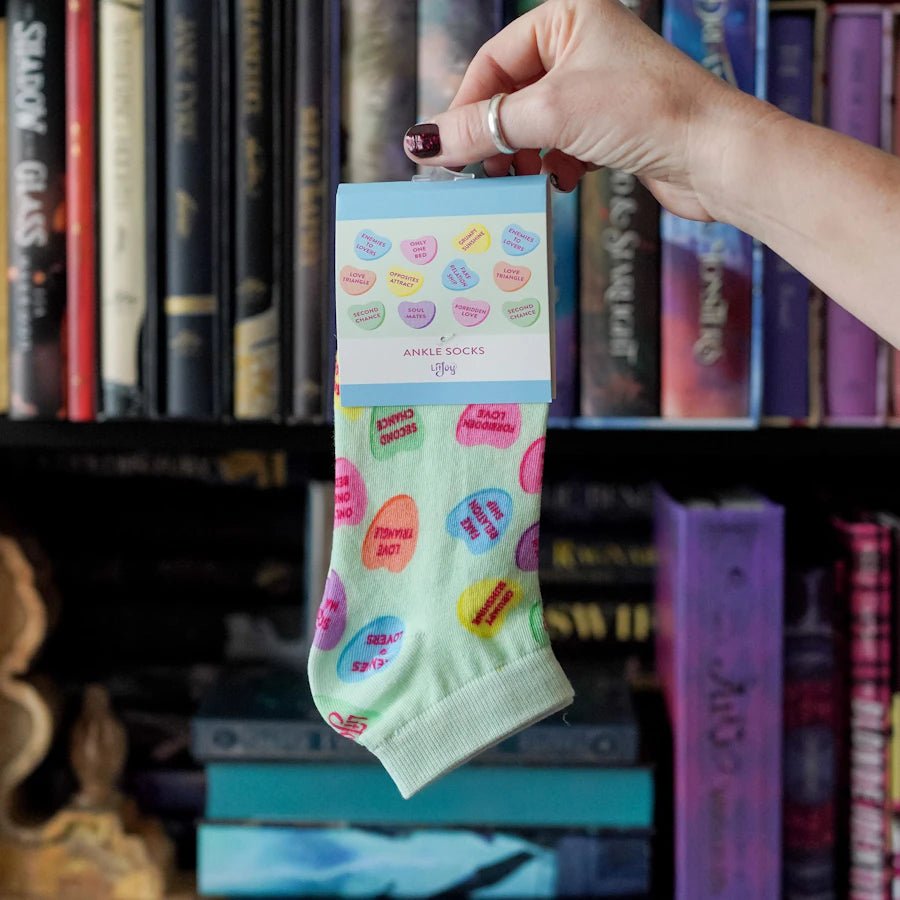 Conversation Heart Ankle Socks are socks with various different Valentines Day conversation hearts printed on each sock.