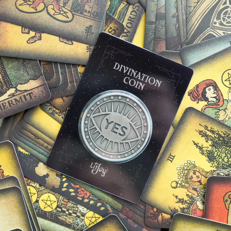 The Divination Coin is gold colored with a raised eye that is open for yes and closed for no.