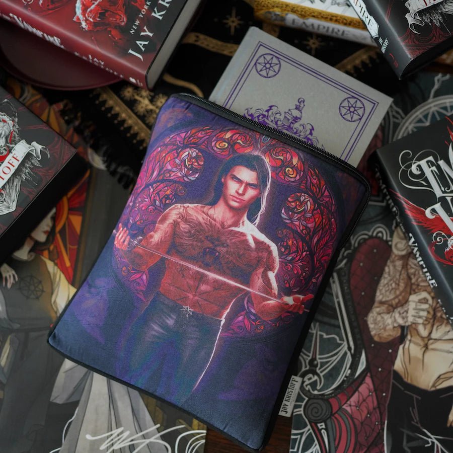 Empire of the Vampire Book Sleeve with an image of Gabriel and Astrid from the Jay Kristoff novel surrounded by stained glass designs.