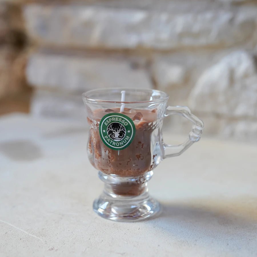 Espresso Patronum Candle shaped like a wizard pub glass with a coffee logo sticker and candle wax inside that looks like coffee foam.