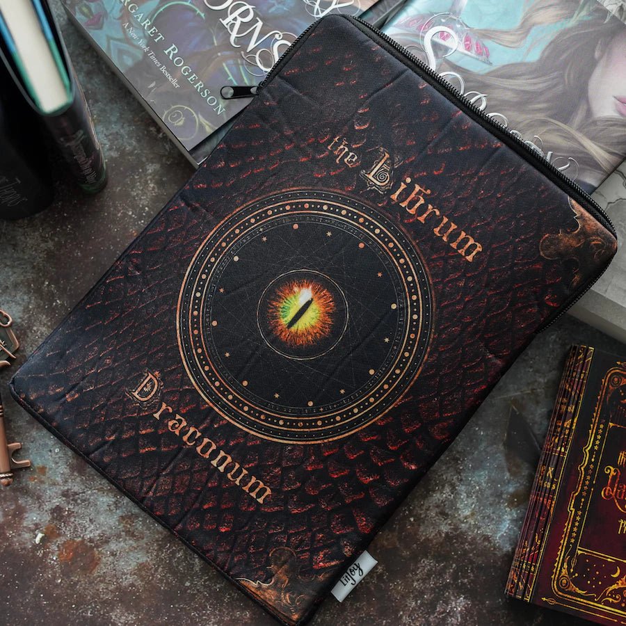 Grimoire Book Sleeve has dragon scale print, magical designs, "The Librum Draconum," and author's name "Margaret Rogerson"