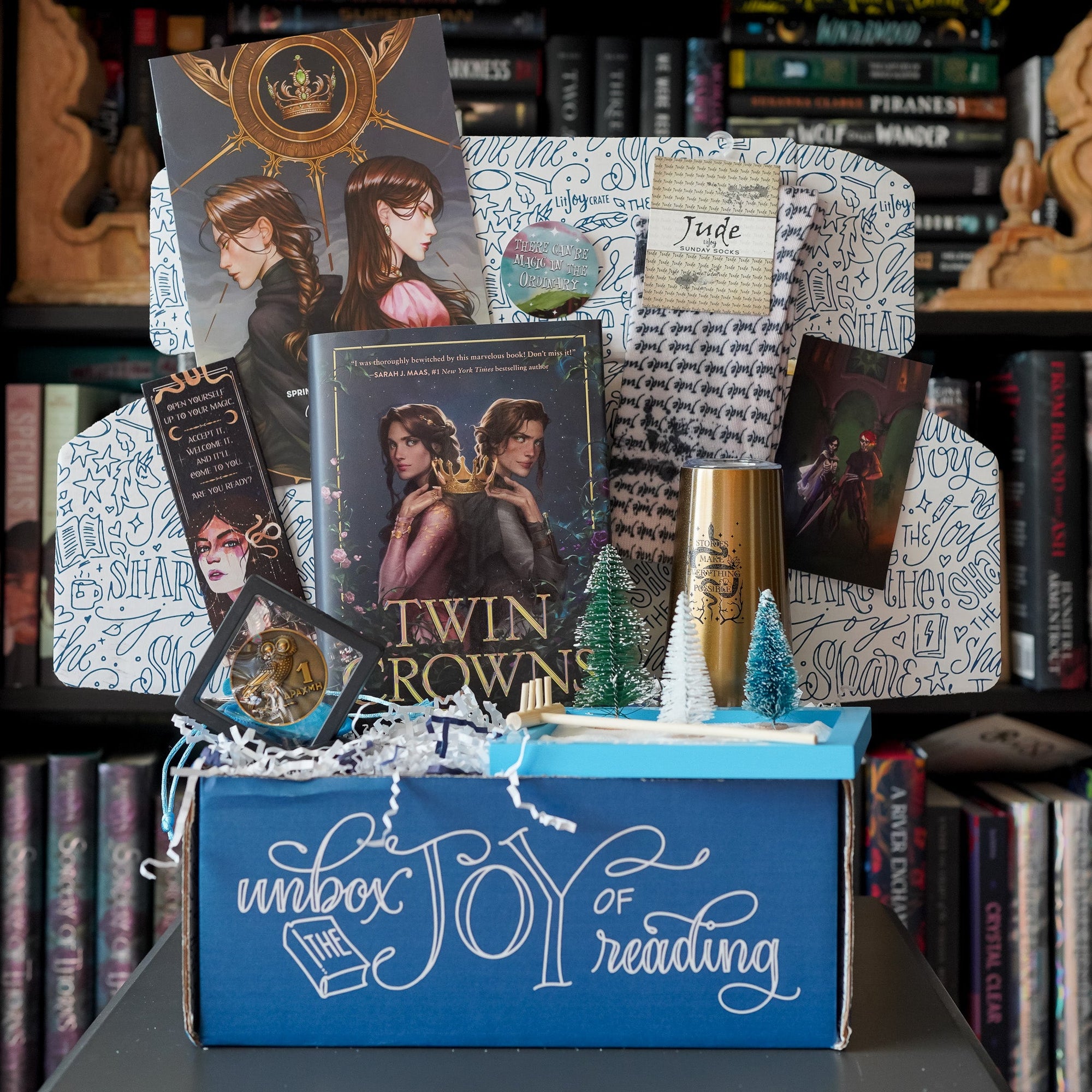 Magic Awakens Crate comes with Twin Crowns, gold wine tumbler, zen garden, collector's coin, and Jude socks