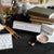 Reader Flippable Desk Plate with various name plates including bibliophile, editor, literary critic, bookworm, and more