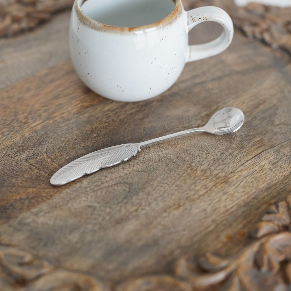 Sugar Quill Spoon with a feather handle and "sugar" written on the bowl of the spoon.