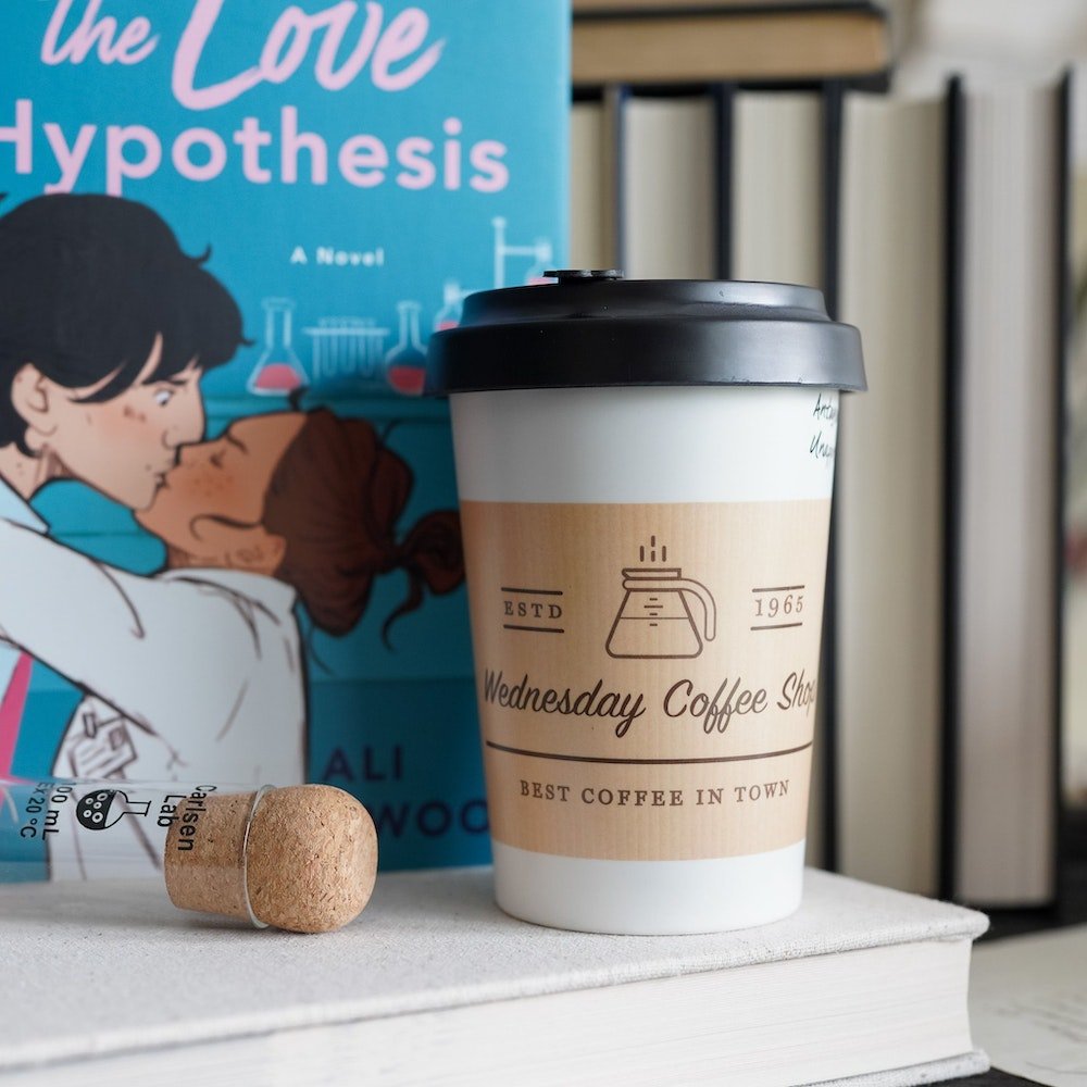 The Love Hypothesis Coffee Cup with a Wednesday Coffee Shop logo and coffee specification checkboxes