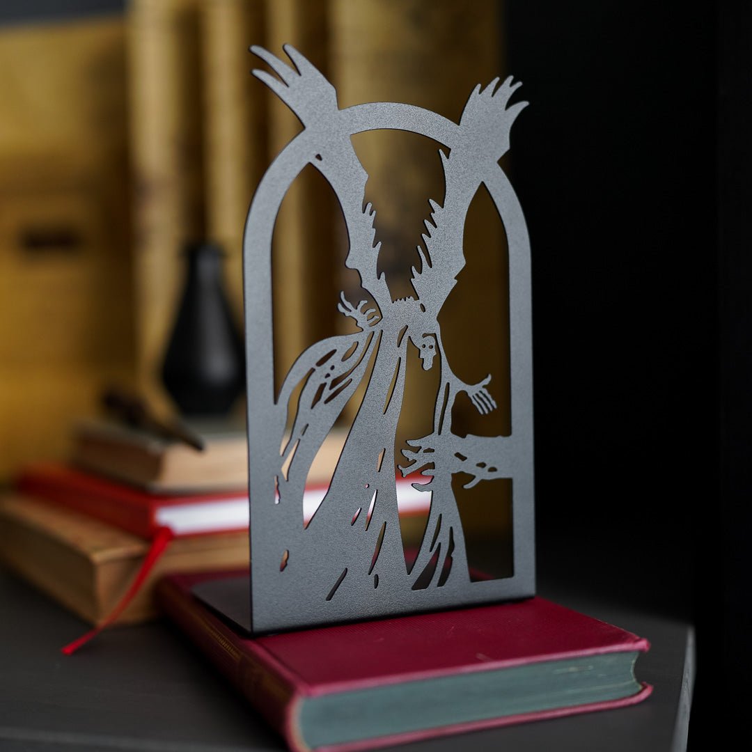  Brothers Bookends are black metal with cutout designs of the three brothers on one side and death on the other side